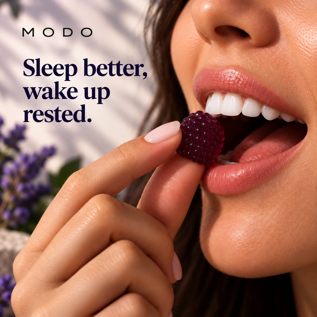 A MODO Dream blackberry lavender gummy being eaten